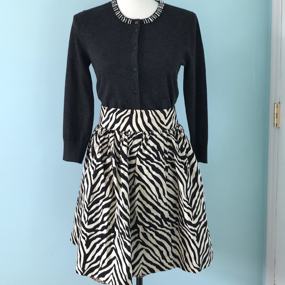 Custom tailored zebra print skirt.